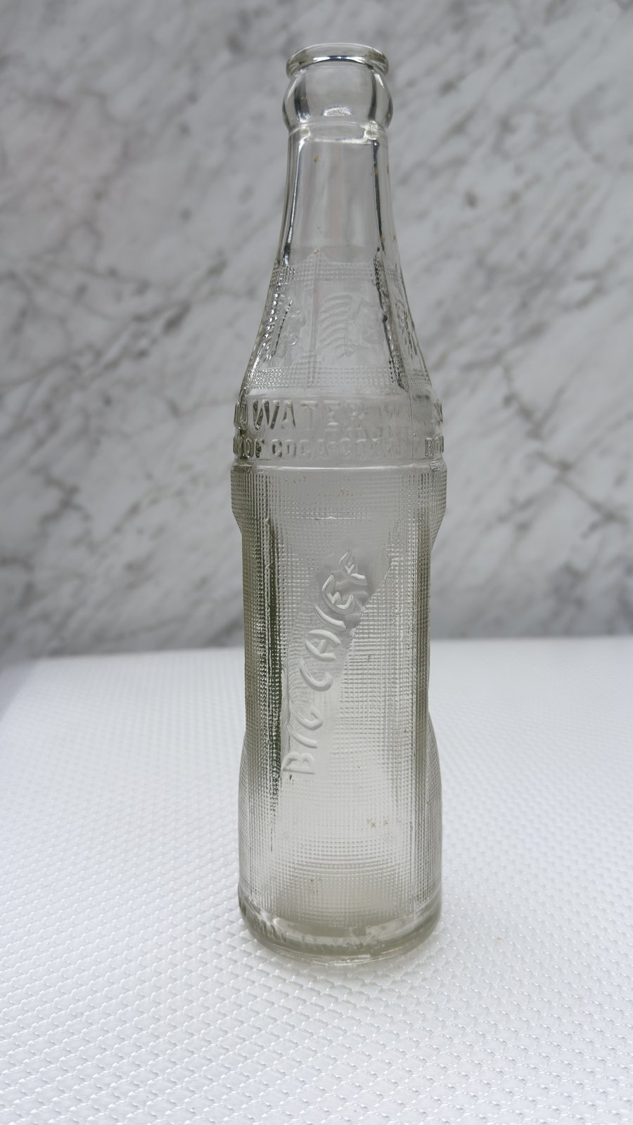 Big Chief bottle showing the BIG CHIEF script and PROPERTY OF COCA-COLA BOTTLING CO shoulder band