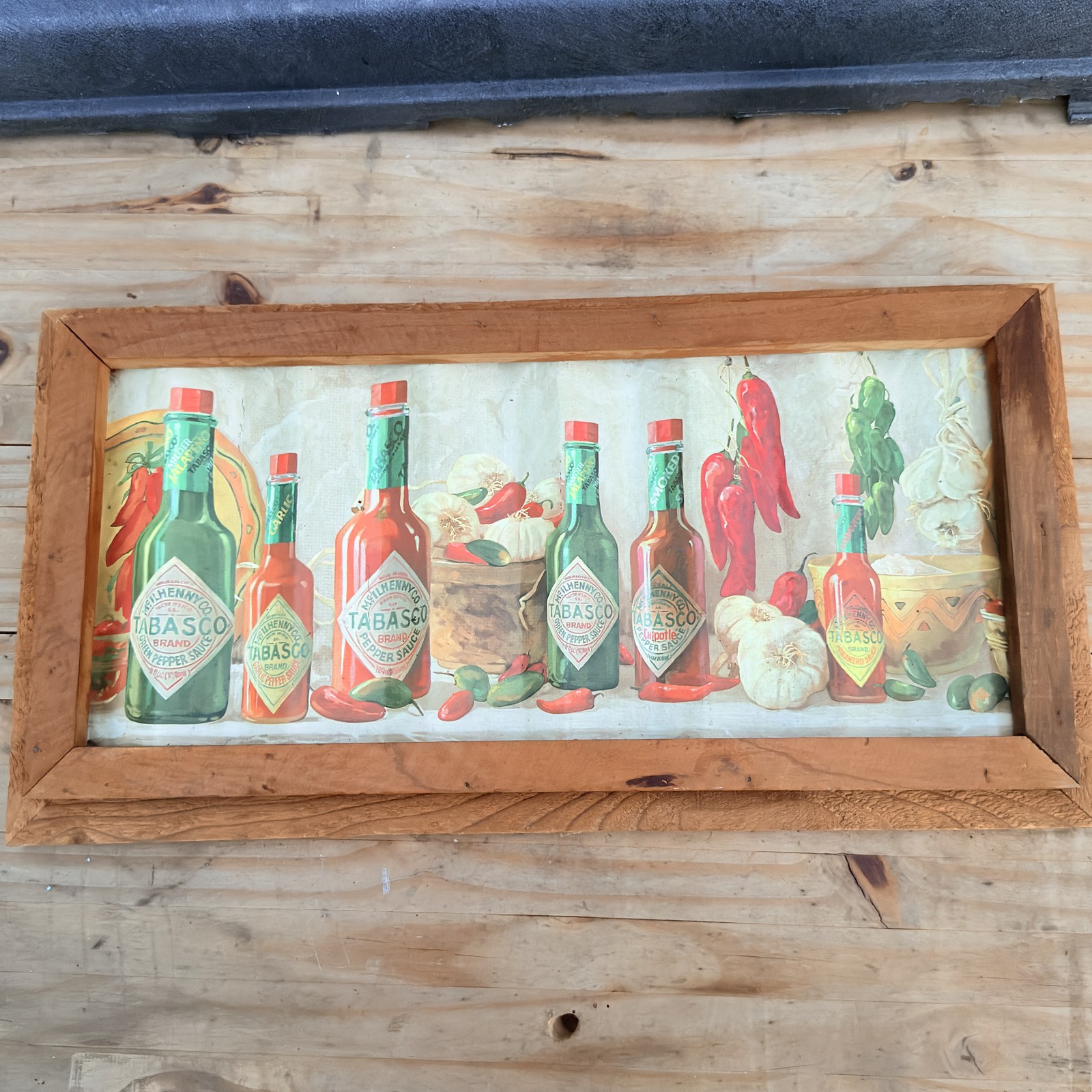 Framed Tabasco Brand pepper sauce corrugated tin wall panel front