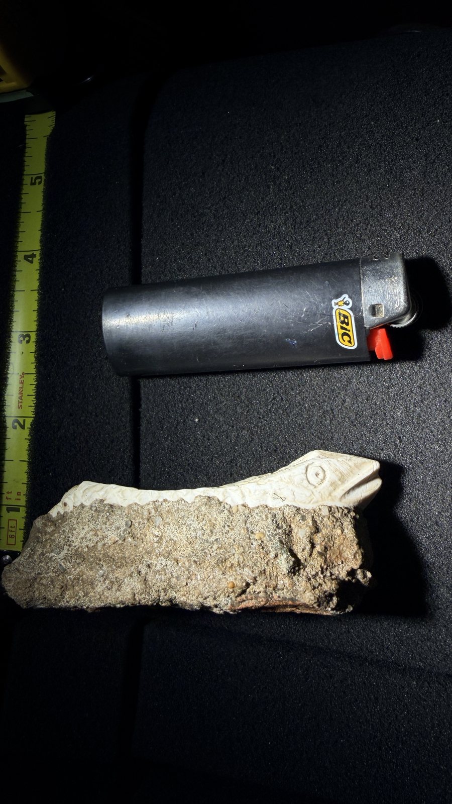 Reddit position 1 hero with yellow tape and black BIC lighter beside the pale structure and gray-brown matrix
