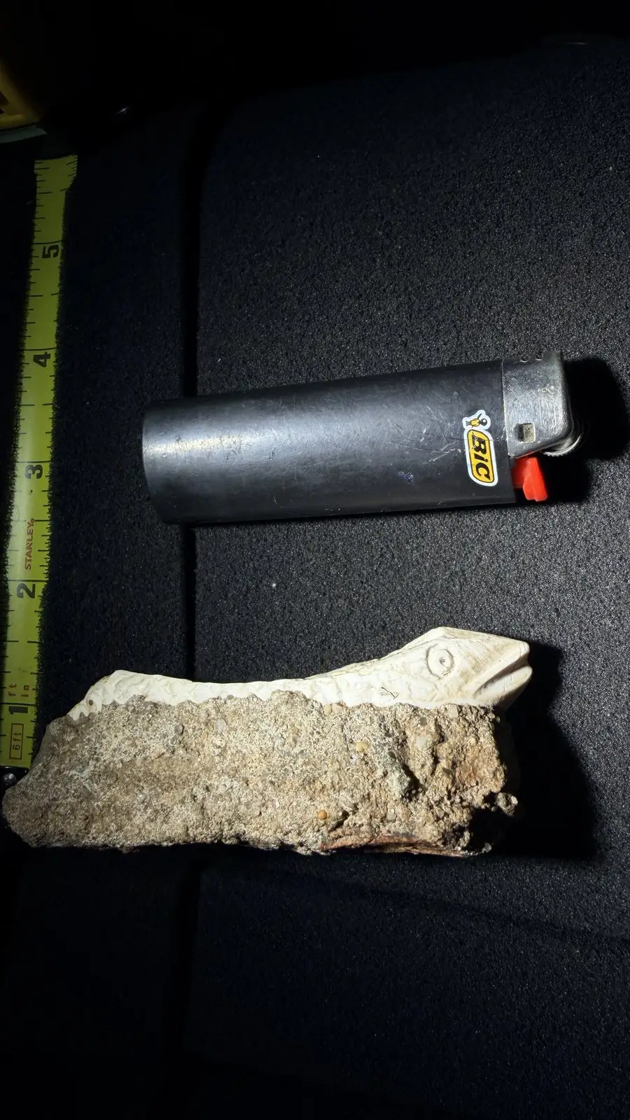 Reddit position 1 hero with yellow tape and black BIC lighter beside the pale structure and gray-brown matrix