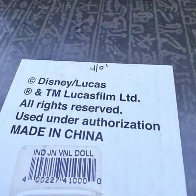 Disney Theme Park Exclusive Indiana Jones copyright and size marking