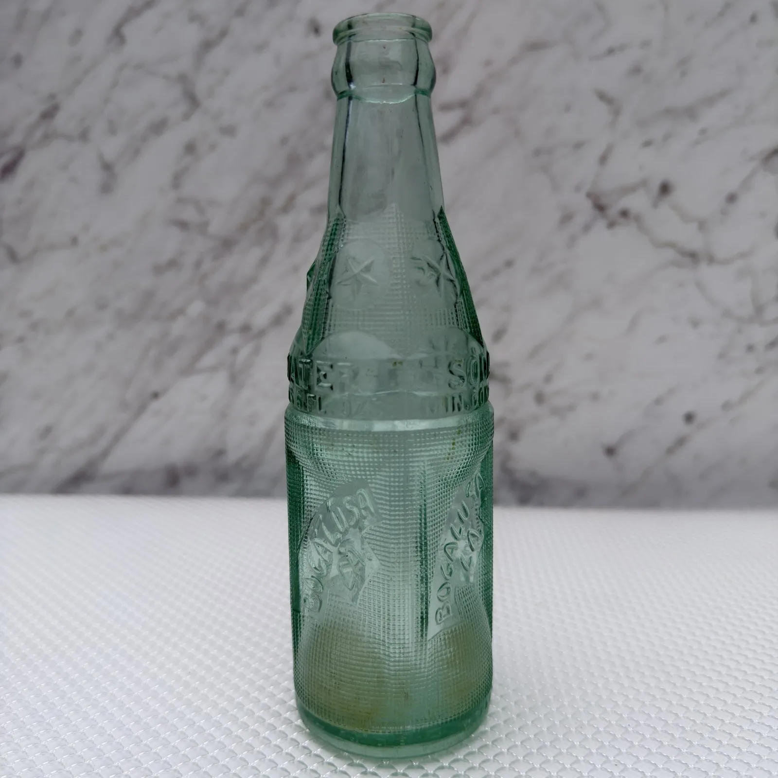 Two Embossed Soda Bottles From Bogalusa, Louisiana