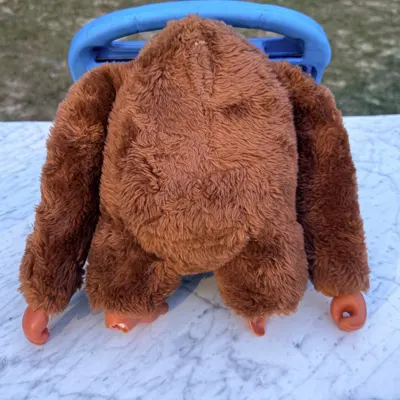Rear full-body view of the vintage Donkey Kong plush showing the brown shag back