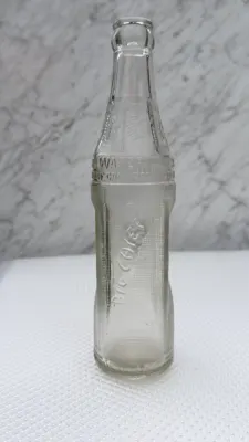 Big Chief bottle showing the BIG CHIEF script and PROPERTY OF COCA-COLA BOTTLING CO shoulder band