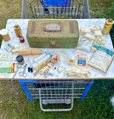 Alternate wider view of the period supplies, showing staining and age wear
