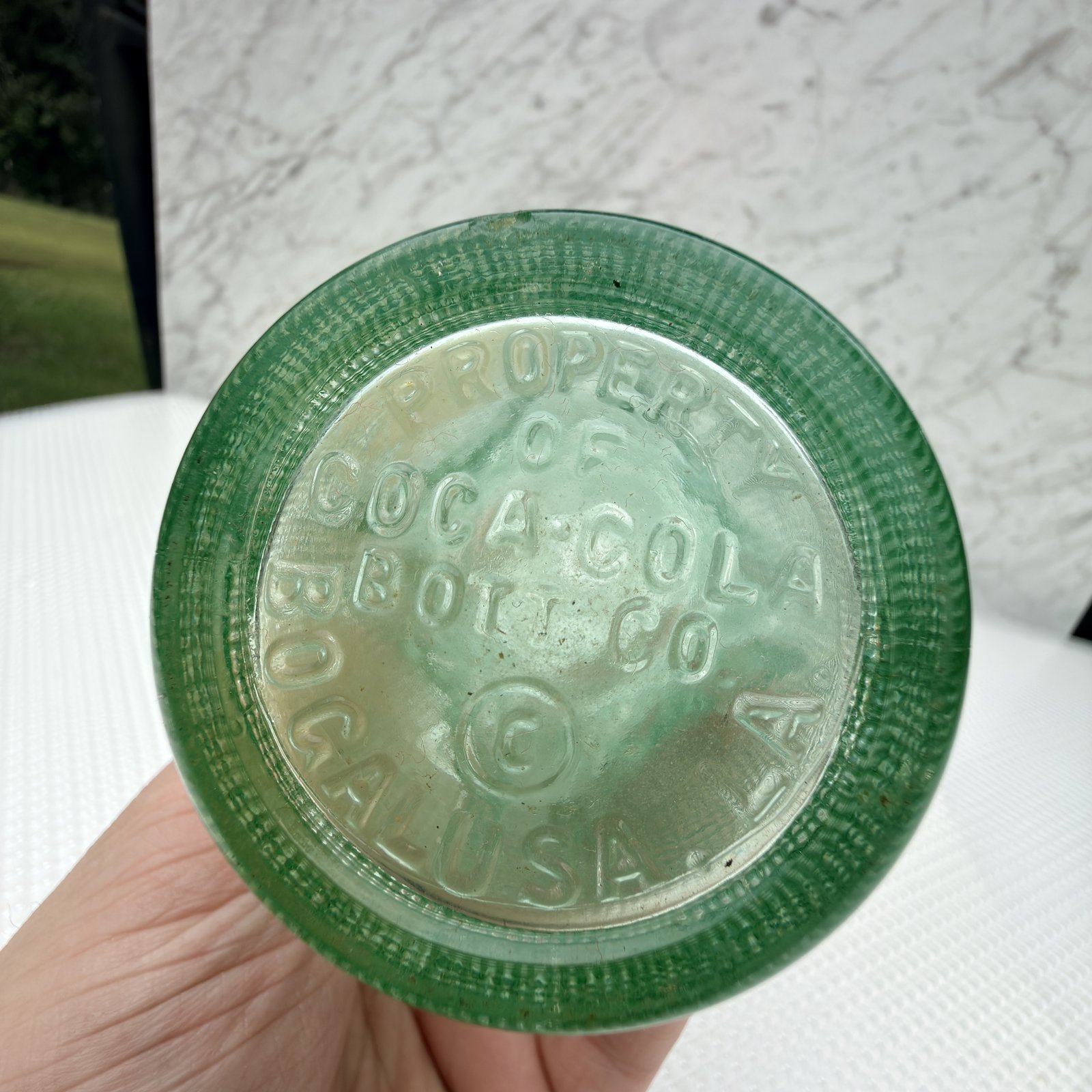 Second view of the bottle base showing the Bogalusa Coca-Cola bottling embossing