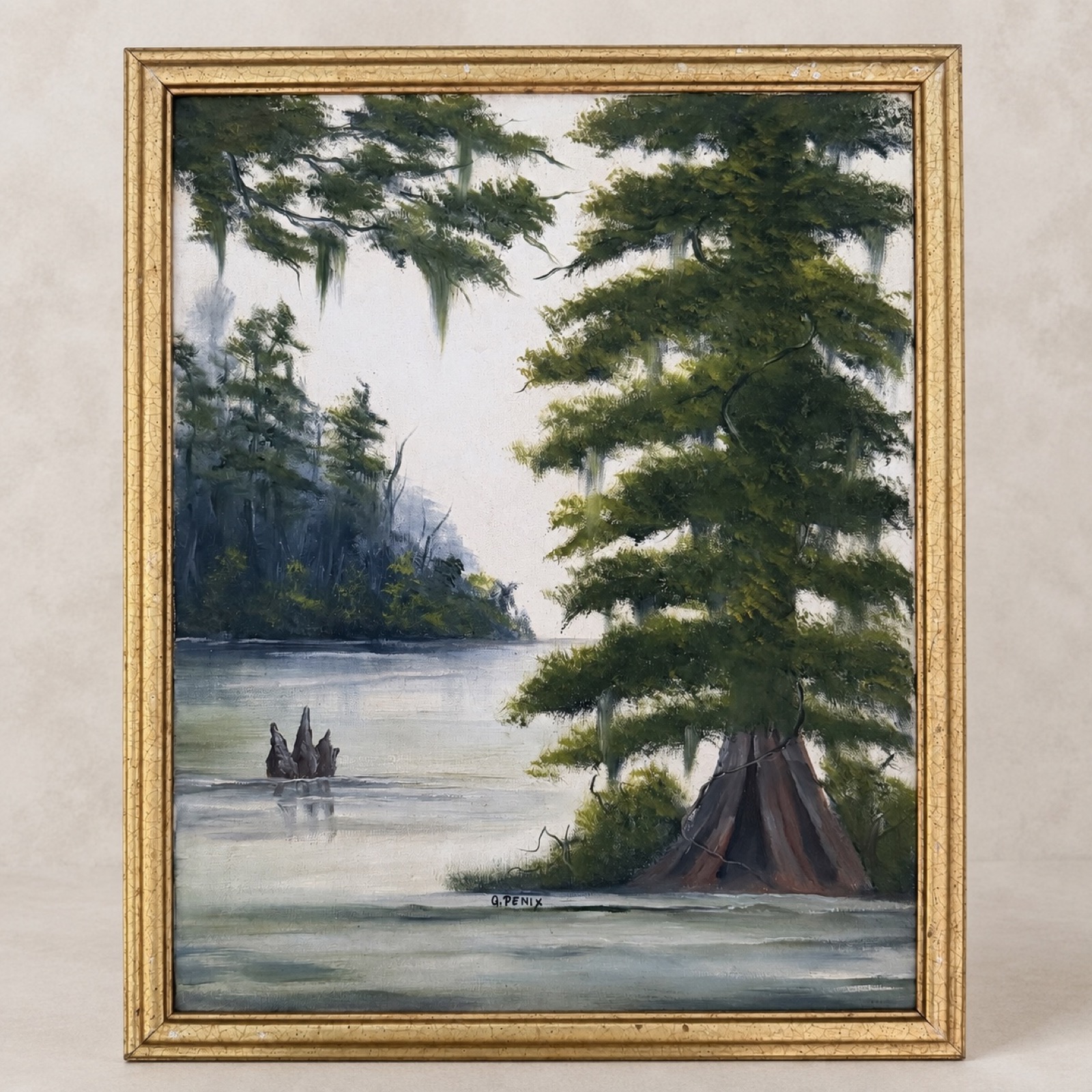 Original oil painting of a Louisiana cypress swamp with Spanish moss and cypress knees, in a gold wood frame
