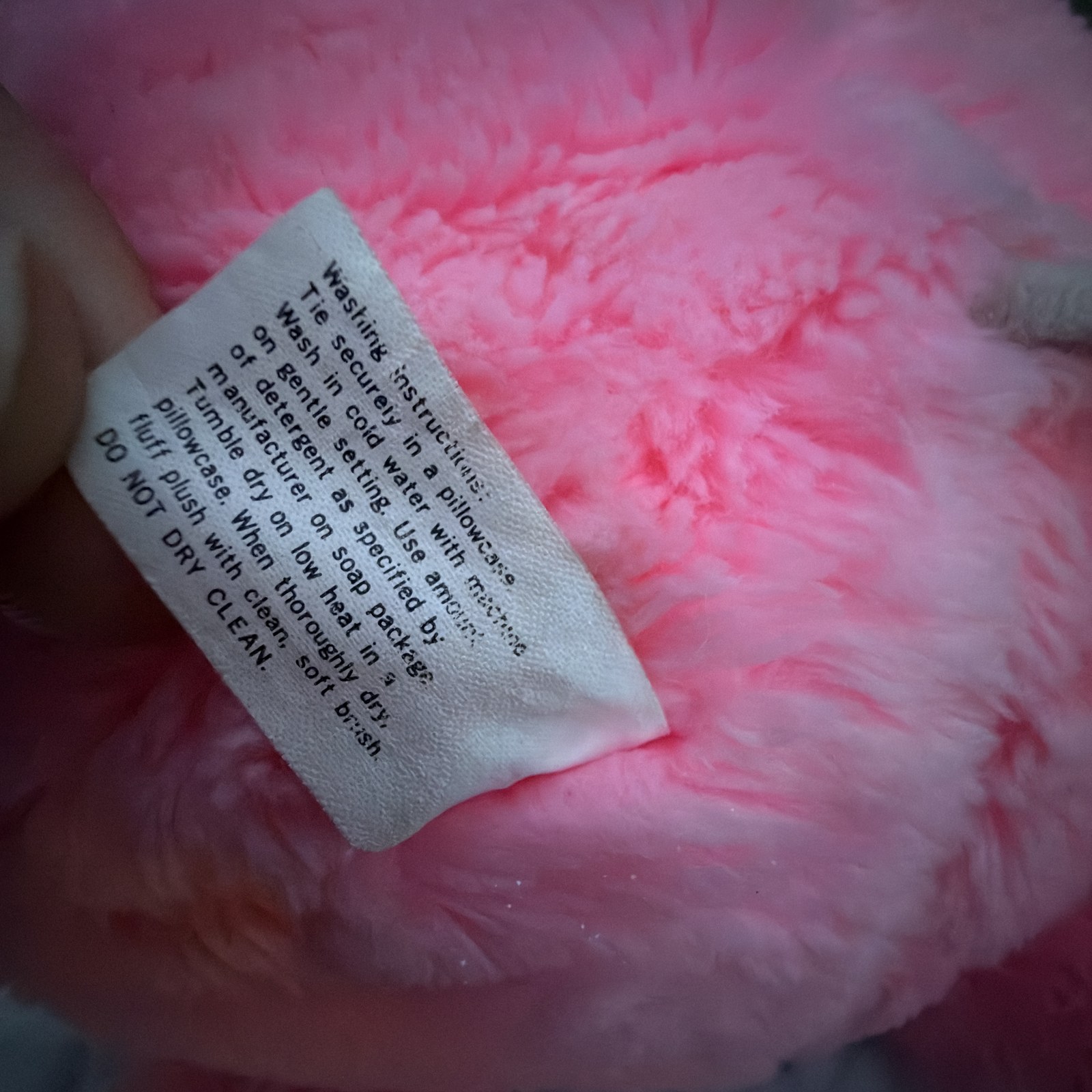 Reverse of the original tag showing the washing and care instructions