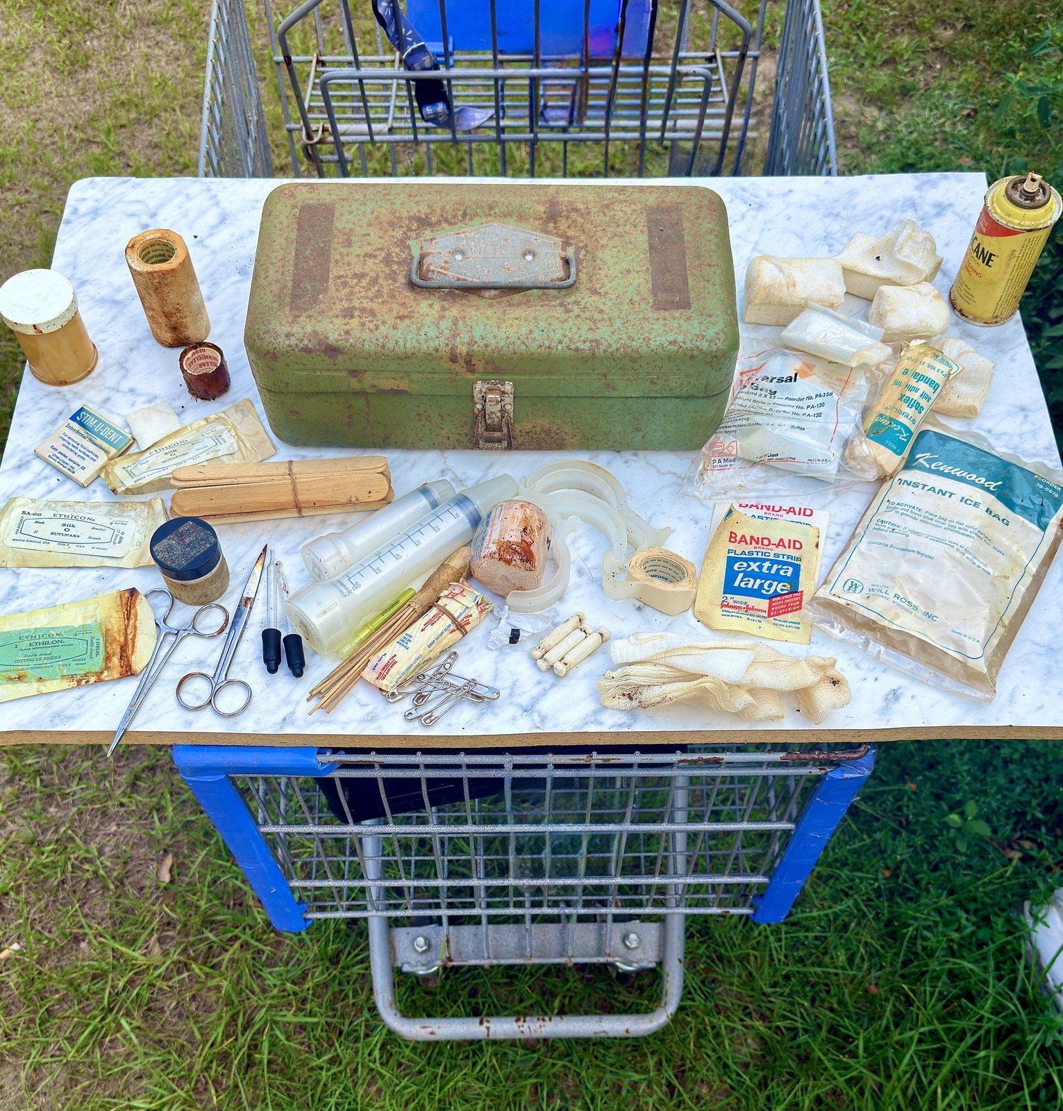 Alternate wider view of the period supplies, showing staining and age wear